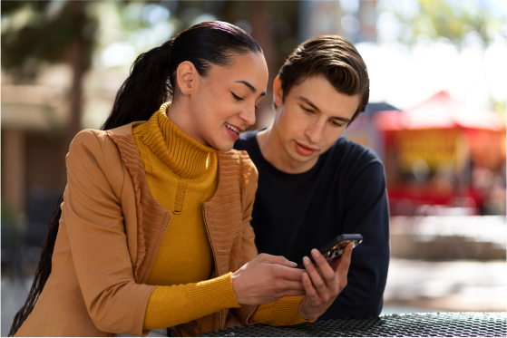 people-engaged-phone-outdoor